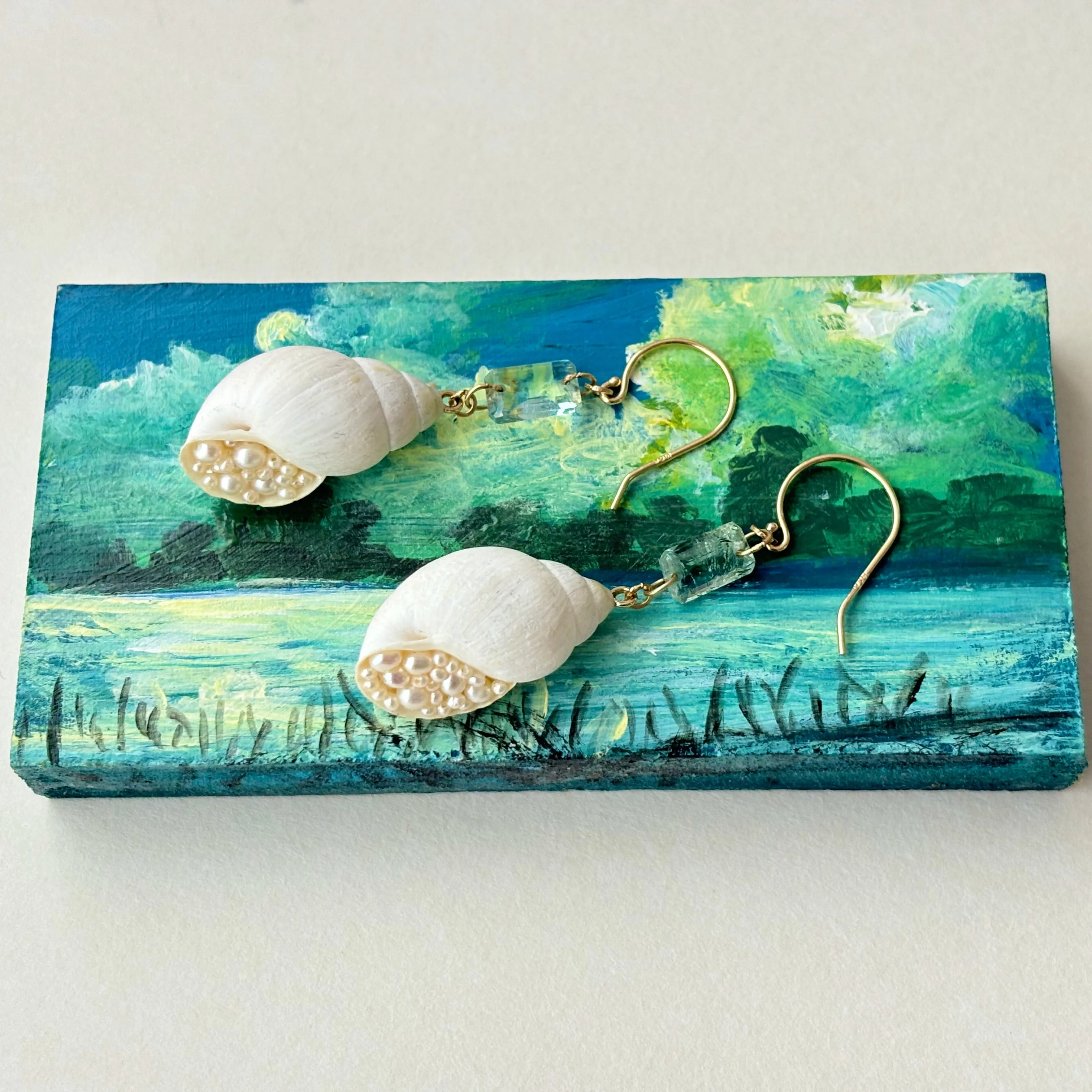 pearl laden seashell and aquamarine gold earrings