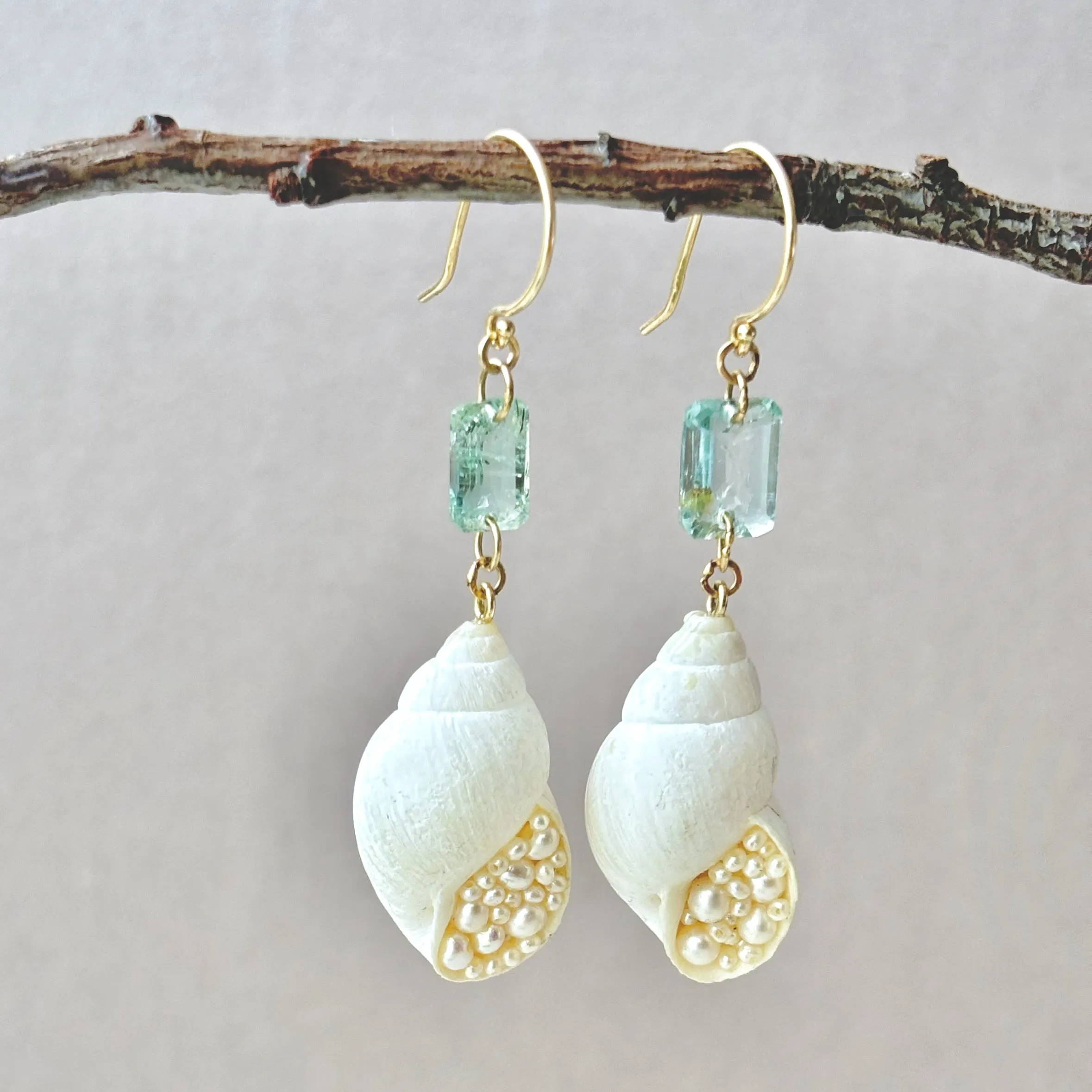pearl laden seashell and aquamarine gold earrings